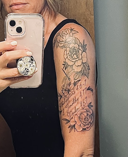 Work by 13 Emeralds Tattoo