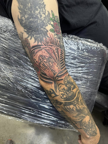 Work by DEAD KAT TATTOO
