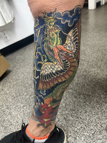 Work by Hammer's Tattoo & Body Piercing