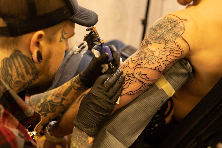 Work by The Inkeeper's Tattoo Parlor