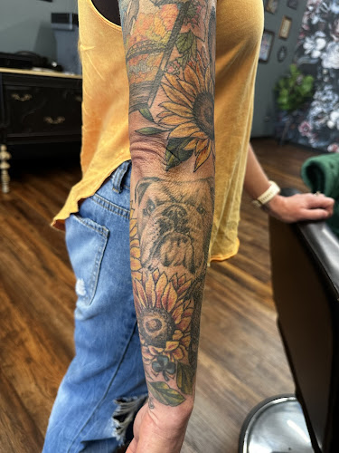 Work by Dog's Tooth Tattoo Company