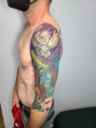 Work by Double Deuce Tattoo and Art Gallery
