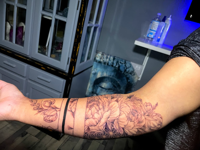 Work by Buddha Blue Tattoo