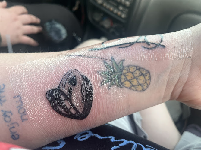 Work by Rainbow Aura Tattoo Boutique