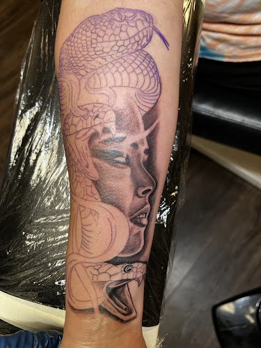 Work by Living Proof Tattoo