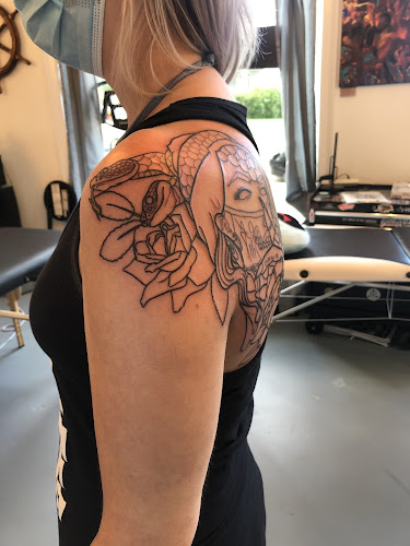 Work by Golden Falcon Tattoo and Piercing