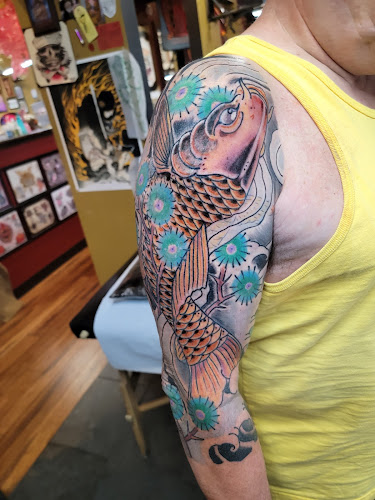 Work by Broken Lantern Tattoo