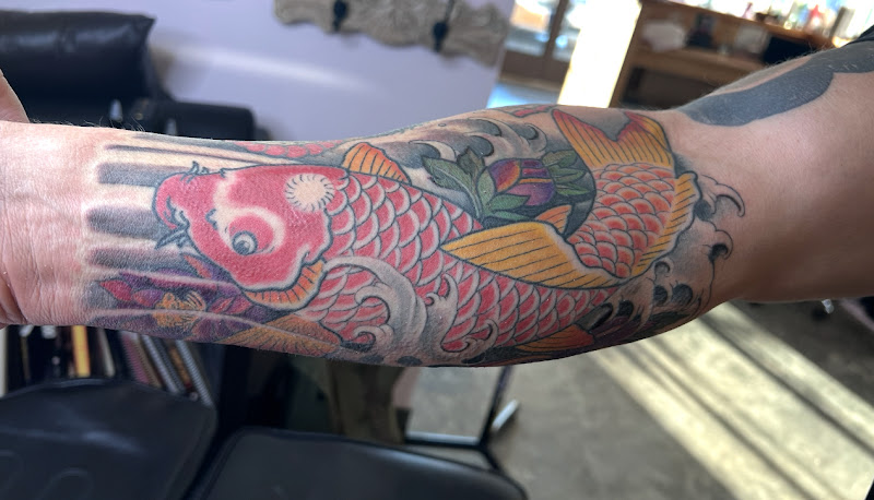 Work by Holy City Tattoo Company