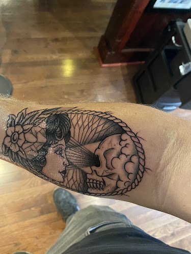 Work by Holy City Tattooing Collective
