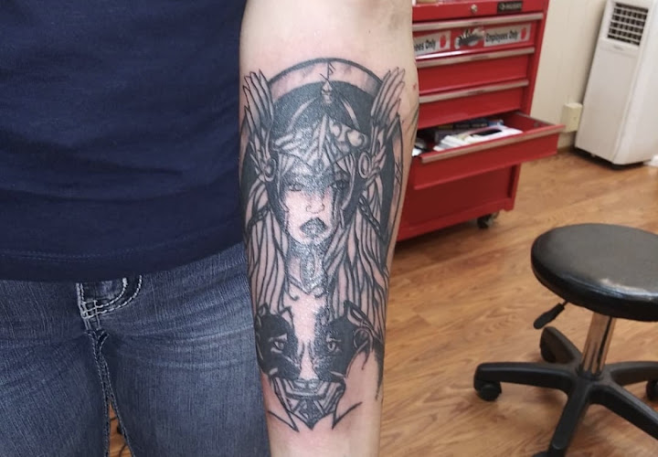 Work by Nemesis Tattoo and Art Gallery