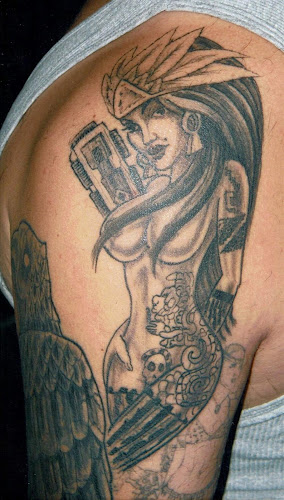 Work by Crown Custom Tattoo Studios (Tattoos,Piercings,Supplies)