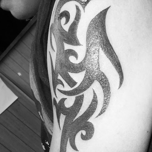 Work by Evolution Tattoo