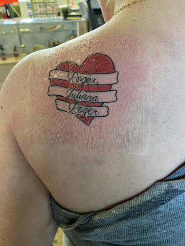 Work by Green Light Tattoo