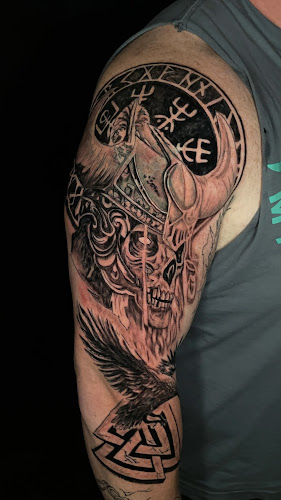 Work by Lone Wolf Tattoo