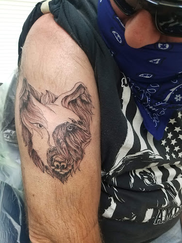 Work by Ricky's Tattooing