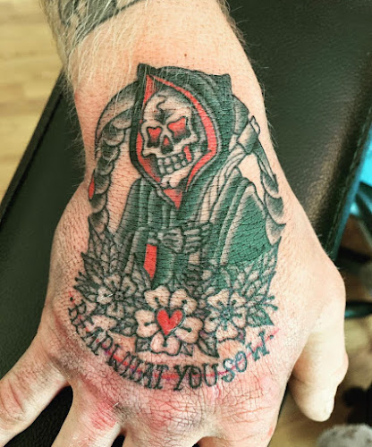 Work by Mad Hatter Tattoo