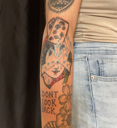 Work by Rough Waters Tattoo Company
