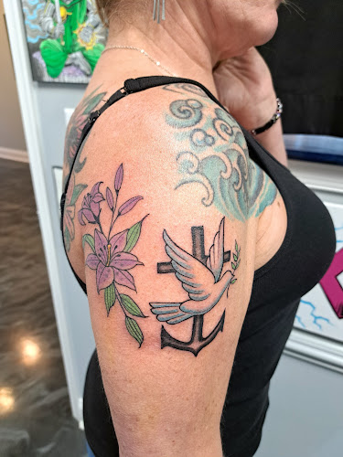 Work by Spitfire Tattoo & Gallery