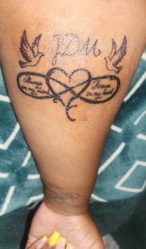 Work by Beauty Is Pain Piercing Studio