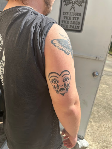 Work by Electric Buzzard Tattoos