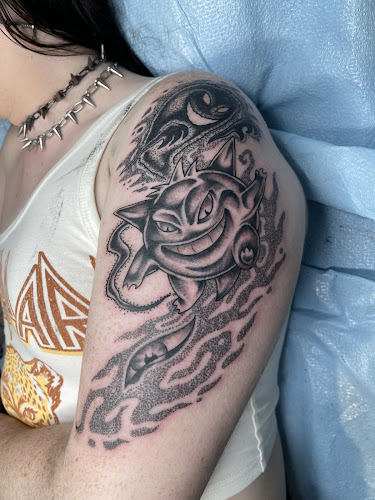 Work by Philosophy Tattoo Collective