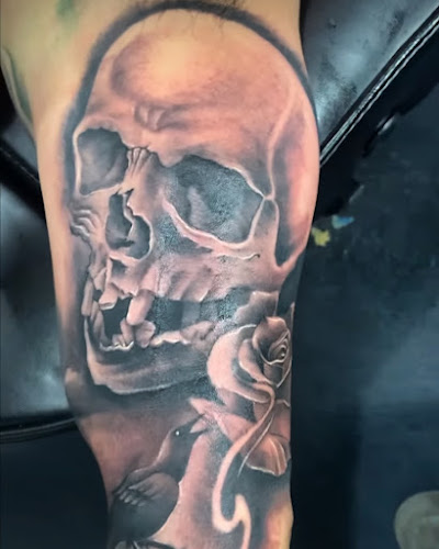 Work by The Wilted Rose Tattoo & Piercing Parlor