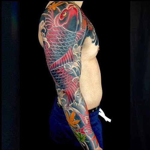 Work by Horseshoes and Hand Grenades Tattoo