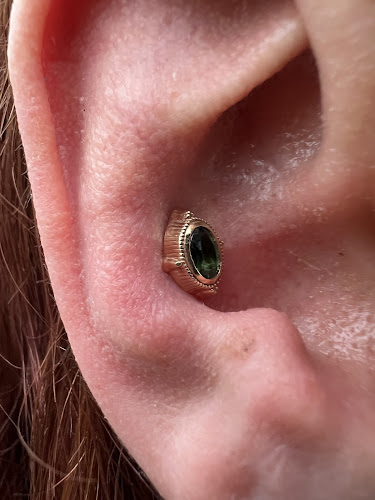 Work by Archetype Fine Jewelry and Body Piercing