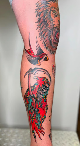 Work by Golden Scythe Tattoo