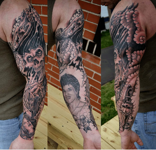Work by One Shot Tattoo