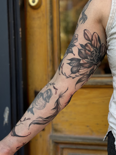Work by Takeout Tattoo