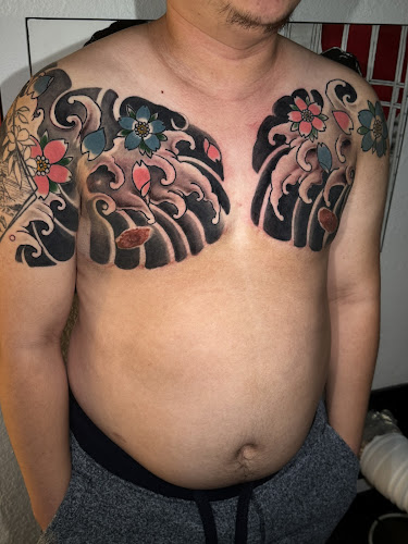 Work by Swan and Sword Tattoo
