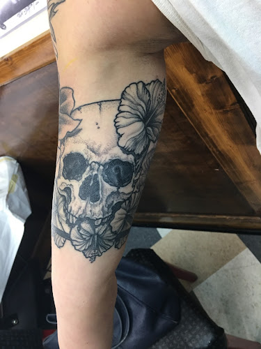 Work by American Tattoo Studios