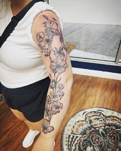 Work by Rorschach Tattoo Shop and Piercing Studio