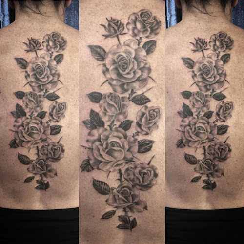 Work by Iron Eel Tattoo