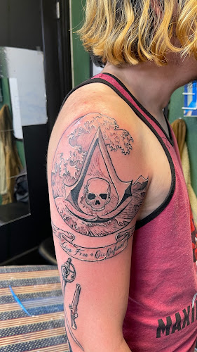 Work by American Banner Tattoos