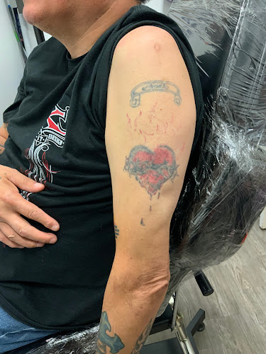 Work by Grey Matter Tattoo Collective