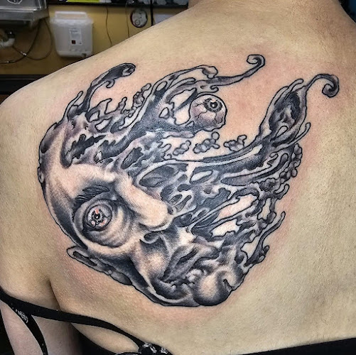 Work by Old North End Tattoos LLC