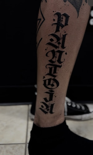 Work by Veiled Halo Tattoo