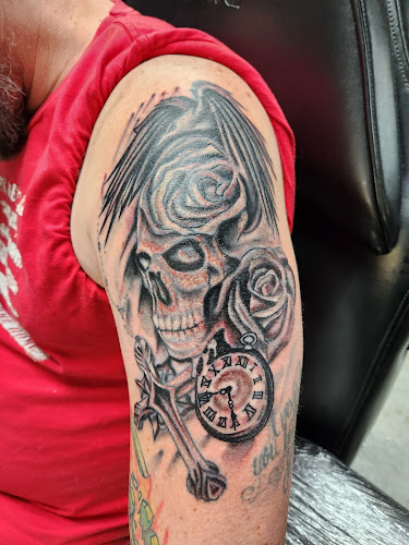 Work by 22 Caliber Tattoo Studio South