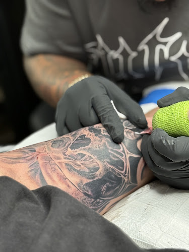 Work by Burned Hearts Tattoo & Art Company