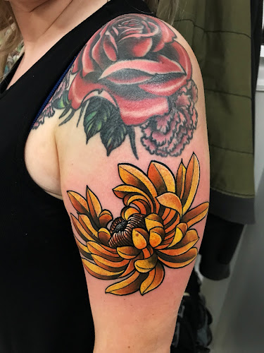 Work by In The Skin Tattoo NC.