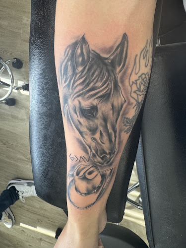 Work by Crossroads Tatttoo and Piercing Studio of Conway