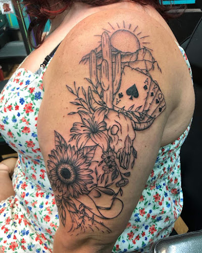Work by Roustabout Tattoo And Body Piercing