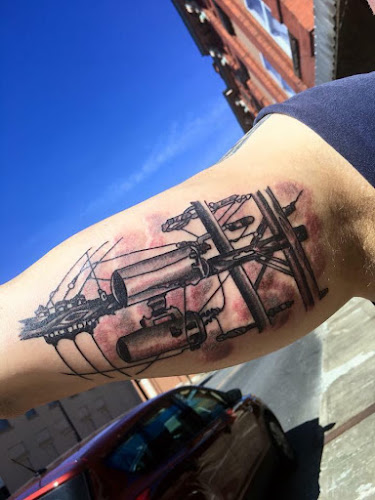 Work by Sixth Street Tattoo & Body