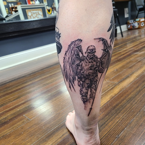 Work by Invisible Hand Tattoo
