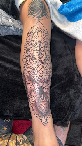 Work by Brooks & James Tattoo/Body Art