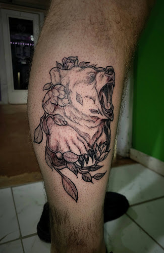 Work by Skull Creek Tattoo