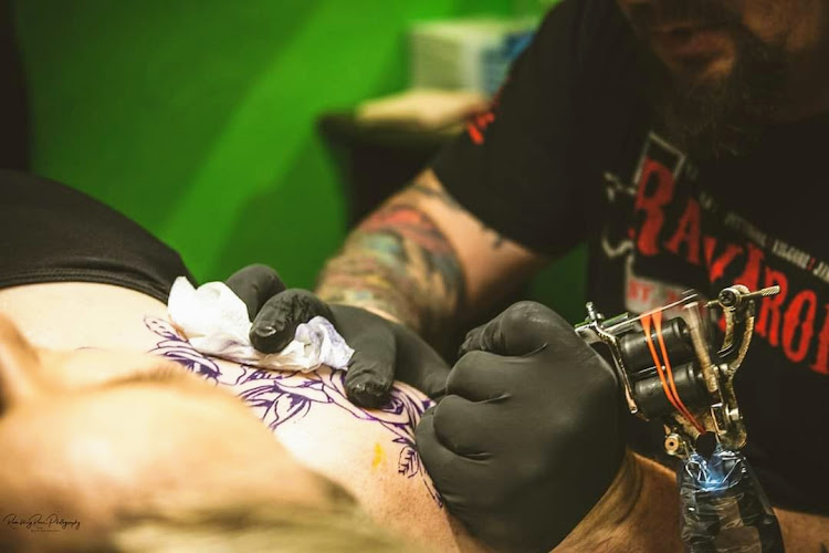 Work by F5 Ink Tattoo Parlor