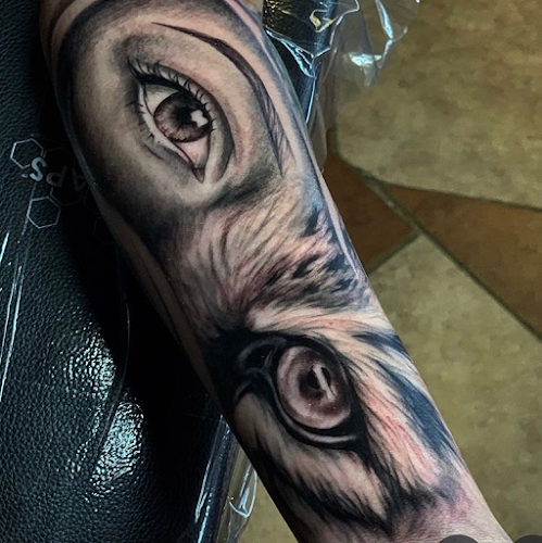 Work by 1up ink Tattoo Studios